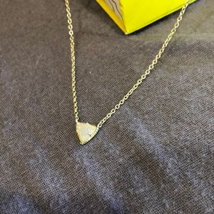 Kendra Scott gold Perry necklace in iridescent drusy